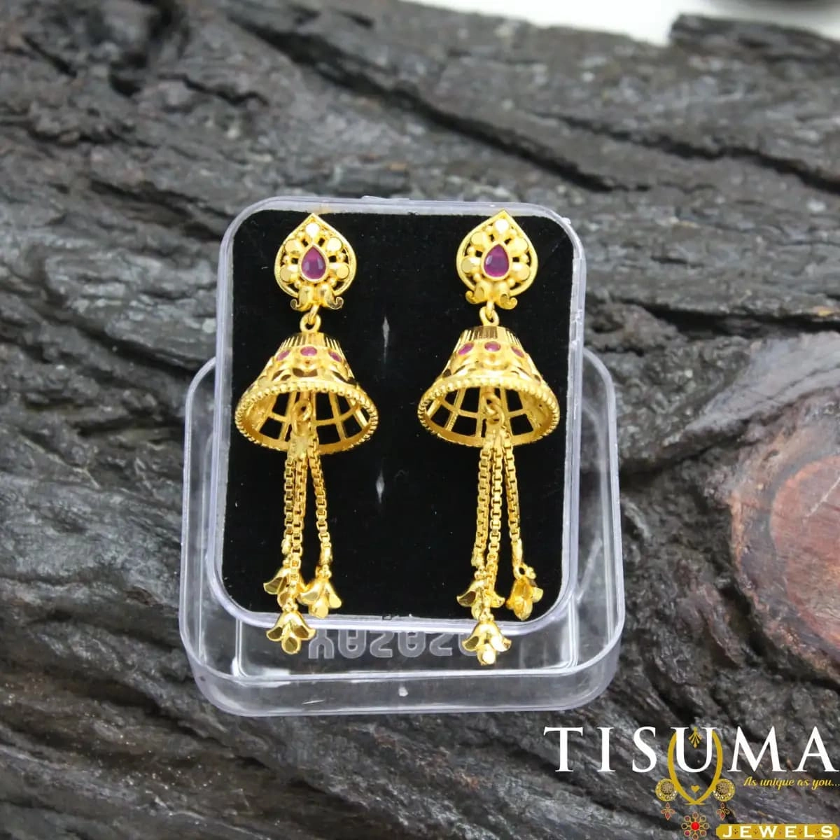 Gold-tone long chain drop jhumka earrings with ruby-pink teardrop stones