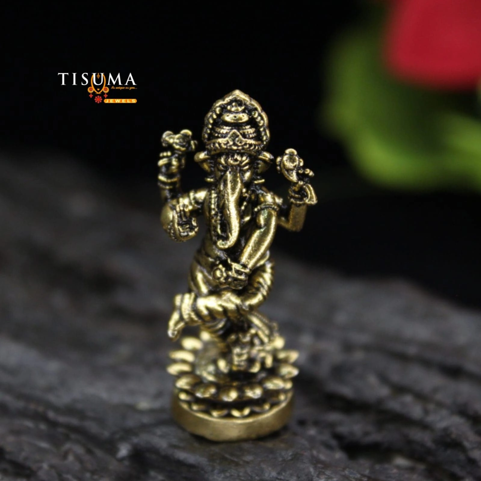 Antique gold-finish Lord Ganesha idol with traditional crown and decorative lotus-style base