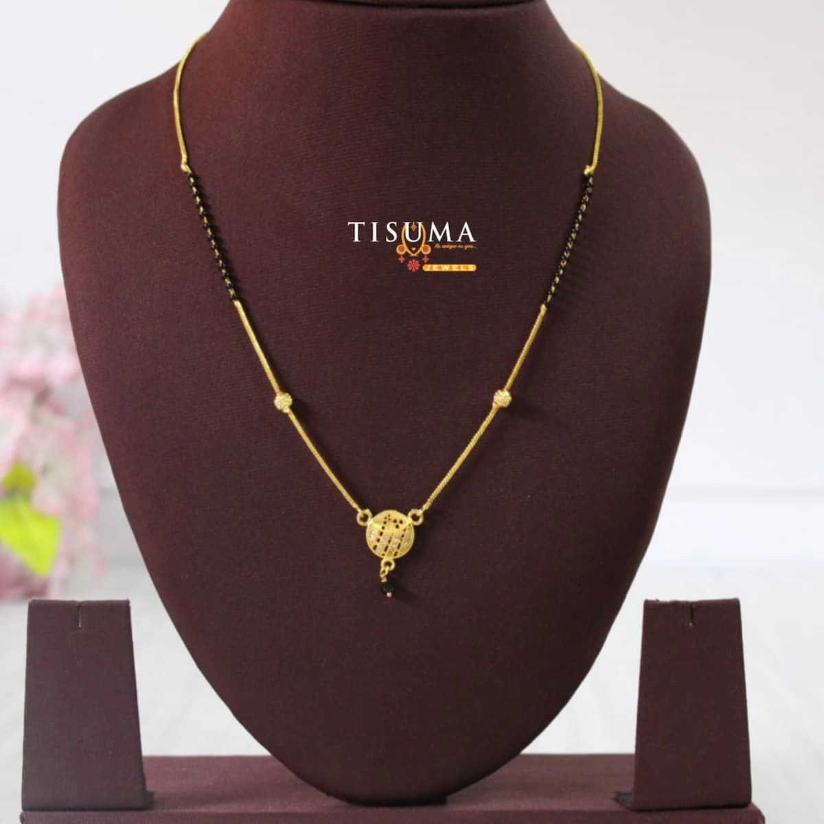 Minimal gold-finish black beads mangal sutra with a round pendant
