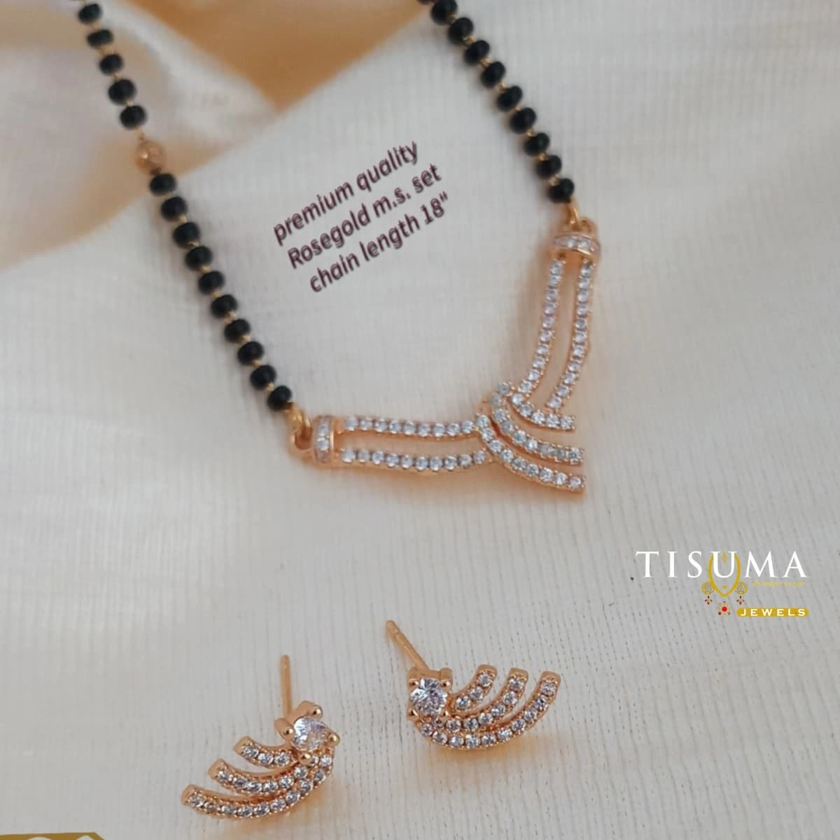 Rose gold mangalsutra set with black beads, white AD stones and matching earrings