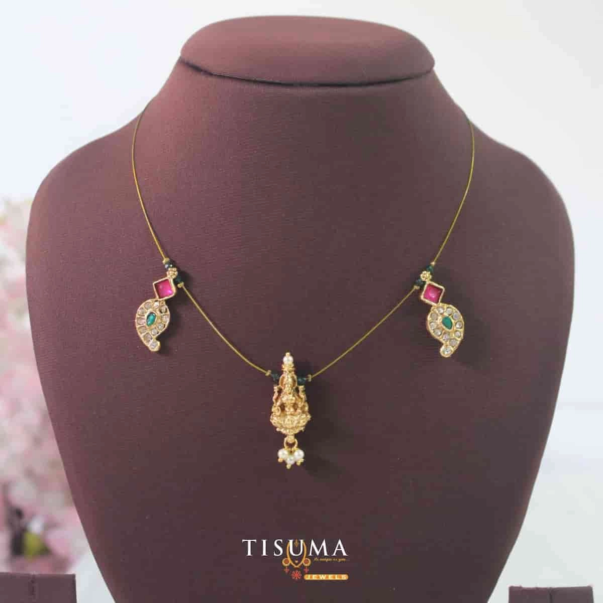Gold finish invisible chain with Lakshmi-style pendant and multicolour stone side motifs
