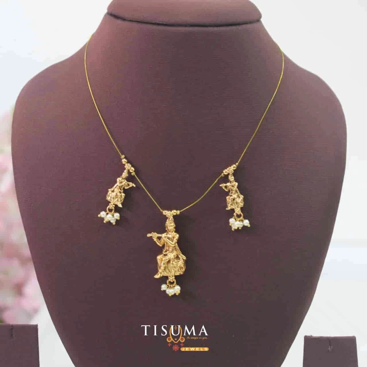 Gold finish invisible chain with Krishna flute pendant and pearl-style drops