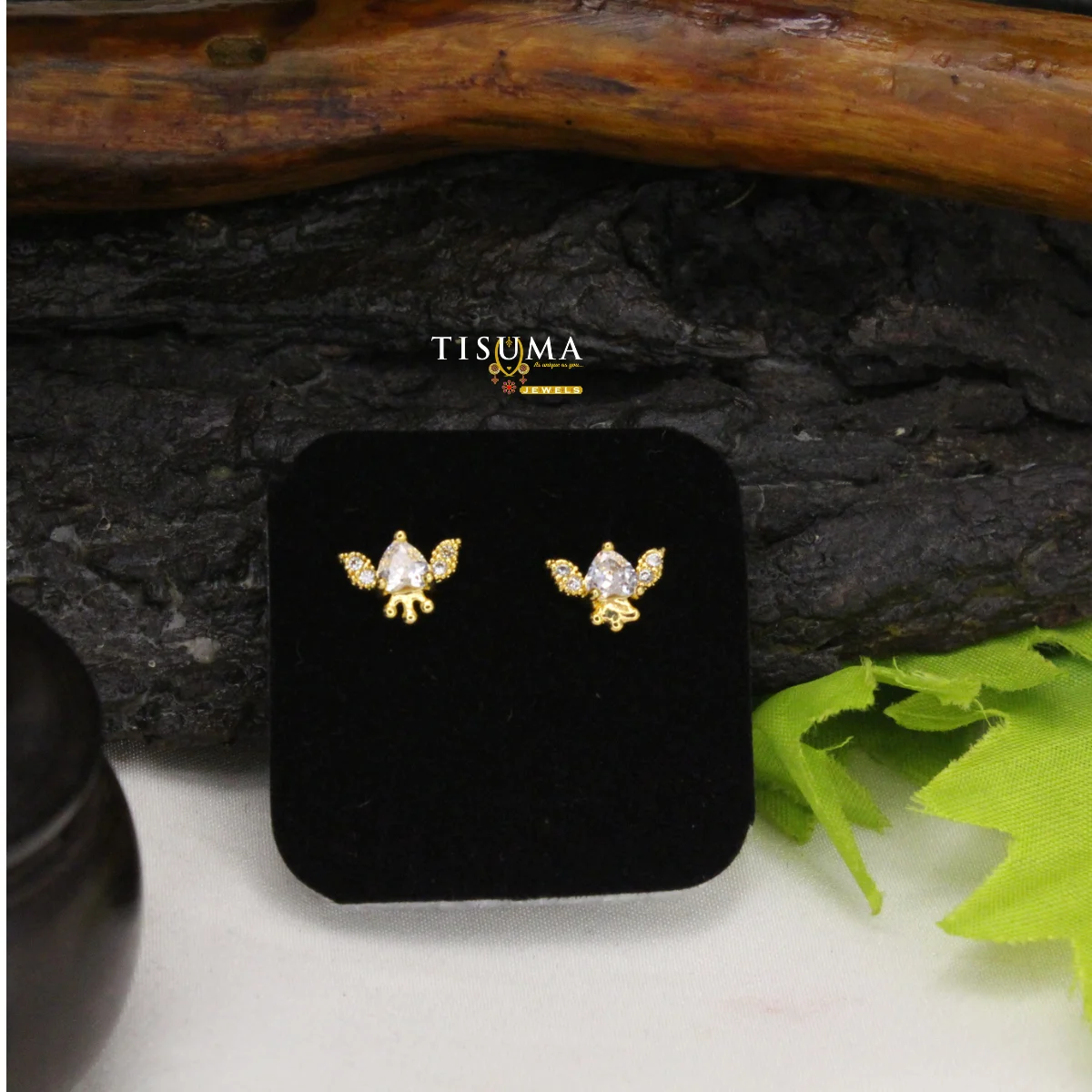 Gold-tone butterfly-inspired stud earrings with clear sparkling stones