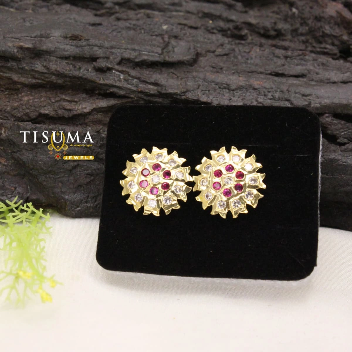 Gold-tone geometric floral stud earrings with ruby-pink and white stones