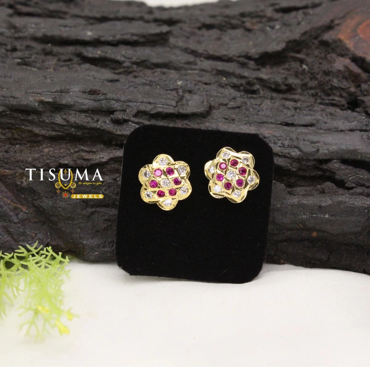 Gold-tone geometric stud earrings with ruby-pink and white stones