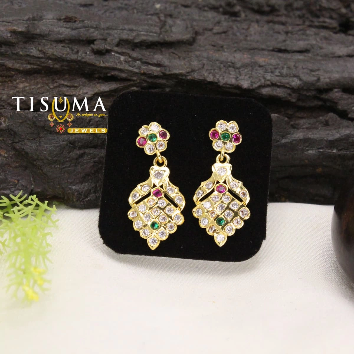 Ruby green AD-style stone designer drop earrings with floral tops and gold-tone detailing