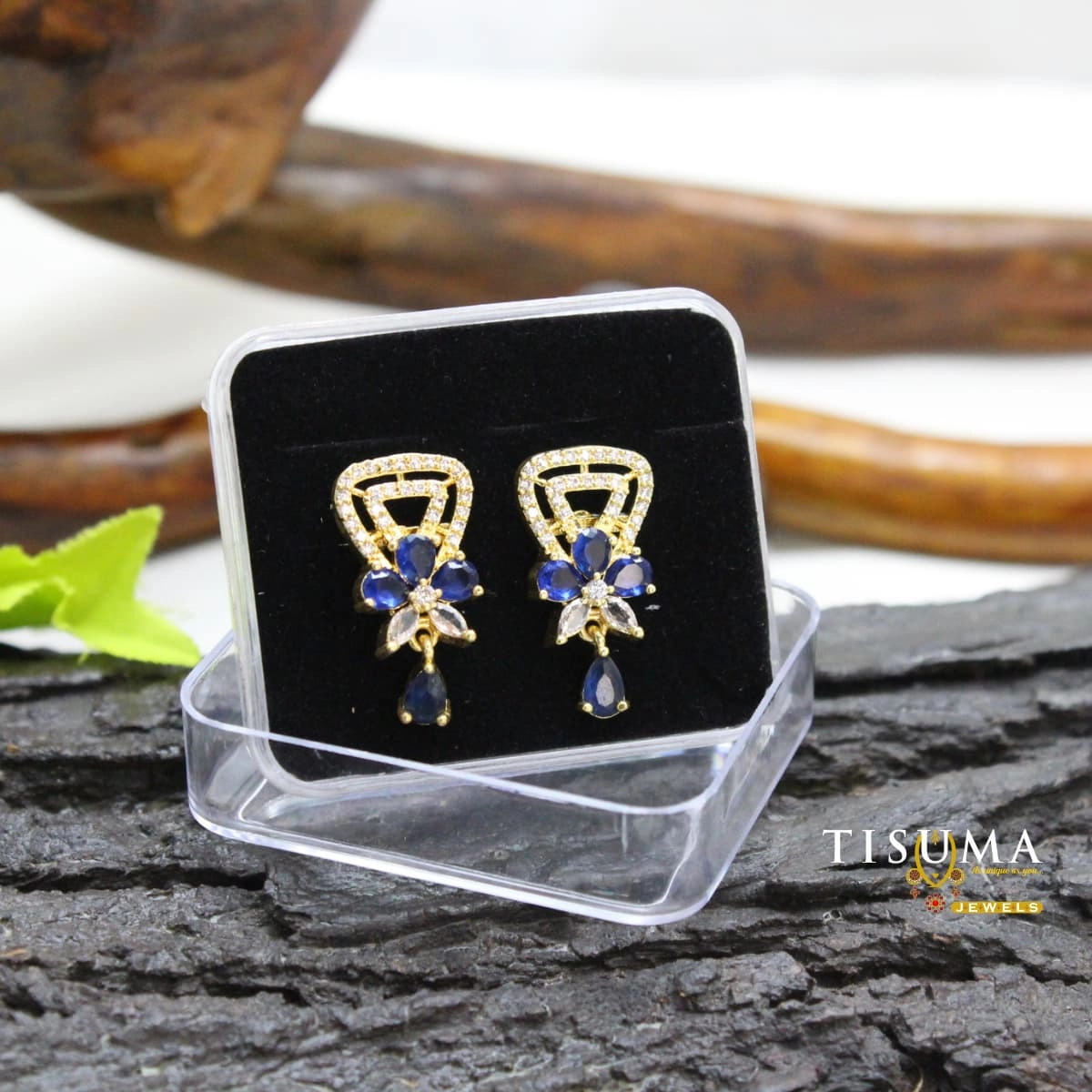 Royal blue floral AD drop earrings with white stones and dangling blue teardrop stones