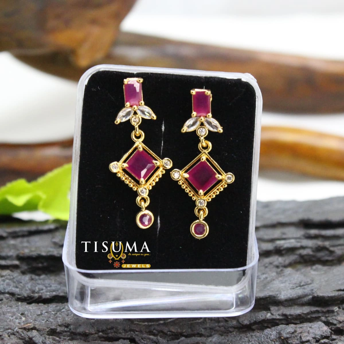 Ruby-pink geometric drop earrings with square stones, white AD-style accents and gold-tone detailing