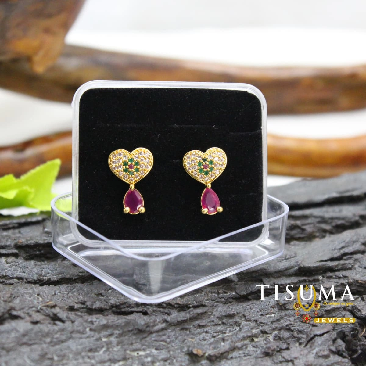 Gold-tone heart-shaped earrings with green and white stones and ruby-pink teardrop drops