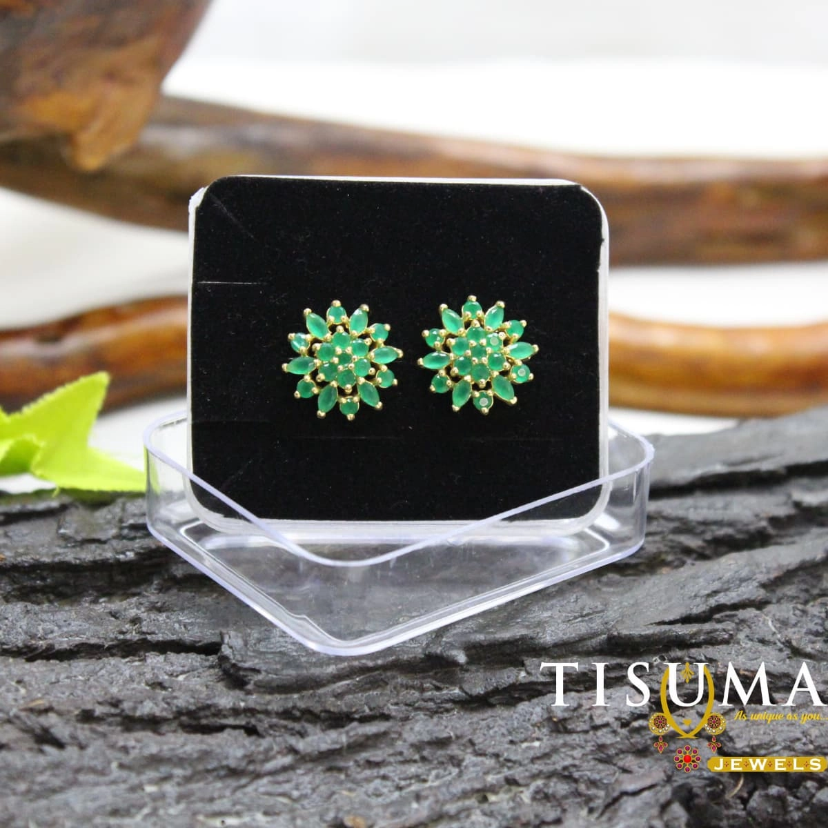 Green floral cluster stud earrings with green petal-shaped stones and a gold-tone setting