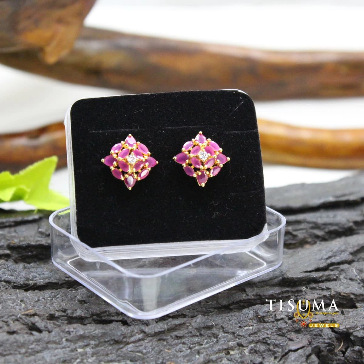 Pink stone floral AD stud earrings with clear centre stones and gold-tone setting