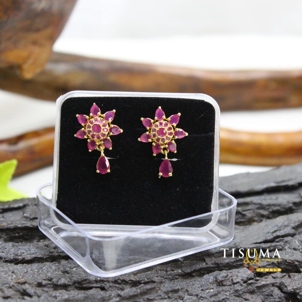 Ruby pink floral drop earrings with teardrop stones and gold-tone detailing