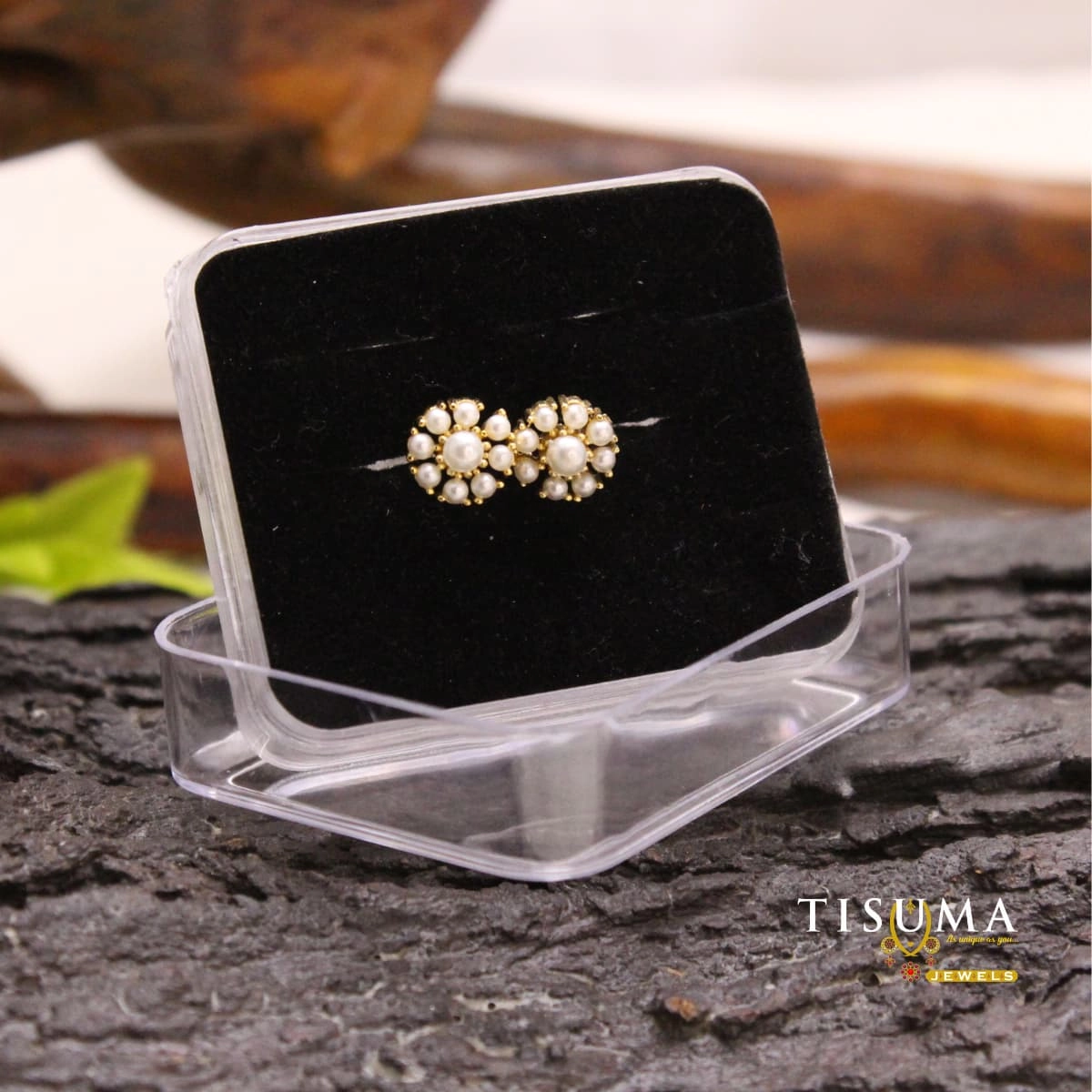 Pair of white pearl floral cluster stud earrings with gold-tone detailing