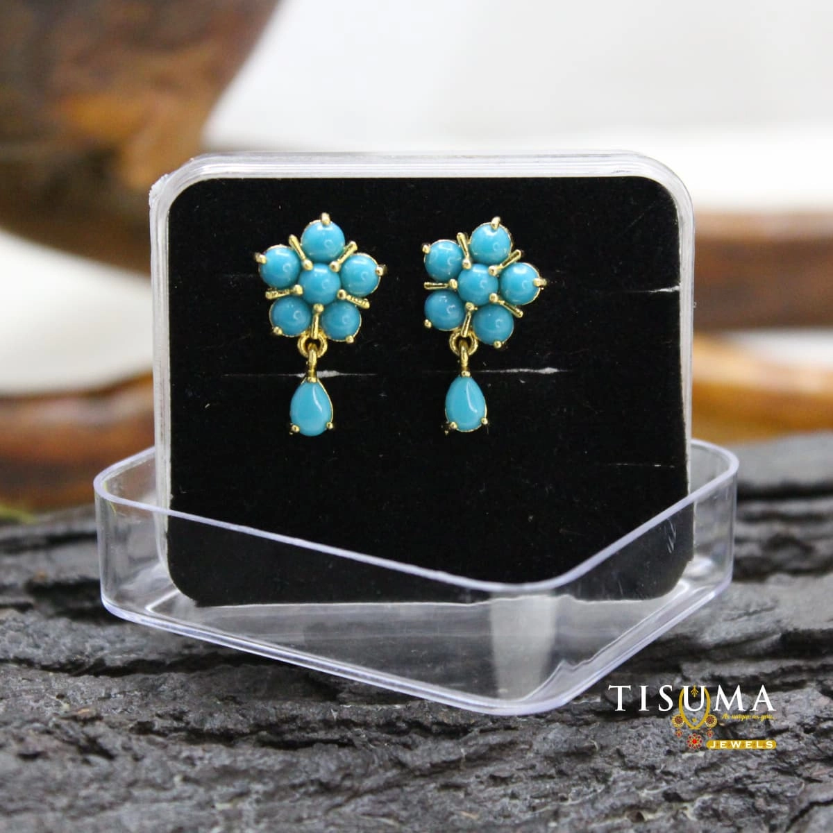 Turquoise blue floral drop earrings with gold-tone finish from Tisuma Jewels