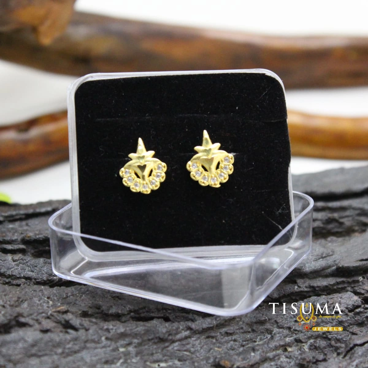 Gold-finish floral AD stud earrings with clear stones from Tisuma Jewels
