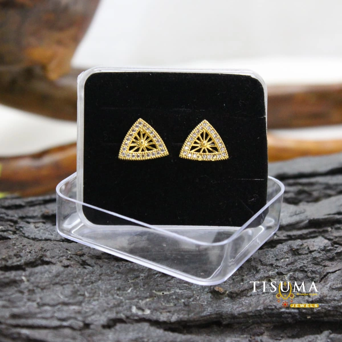 Gold-finish triangular AD stud earrings with clear stones and sunburst design