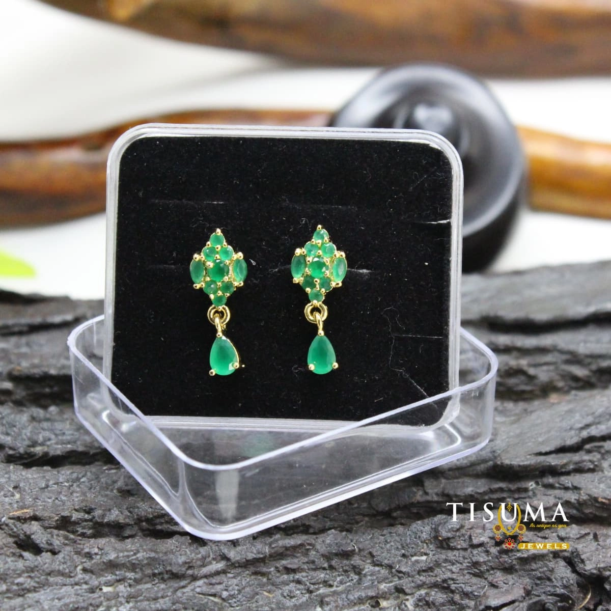 Green stone drop earrings with gold-tone detailing and matching teardrop stones