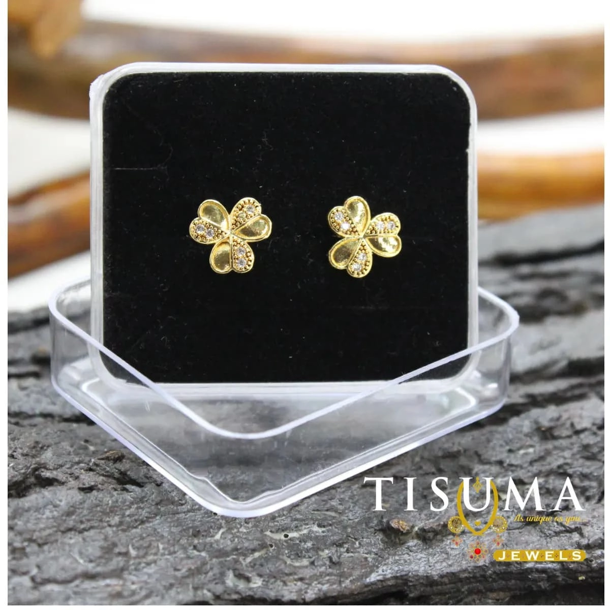 Gold finish four-petal floral clover stud earrings with white stone detailing