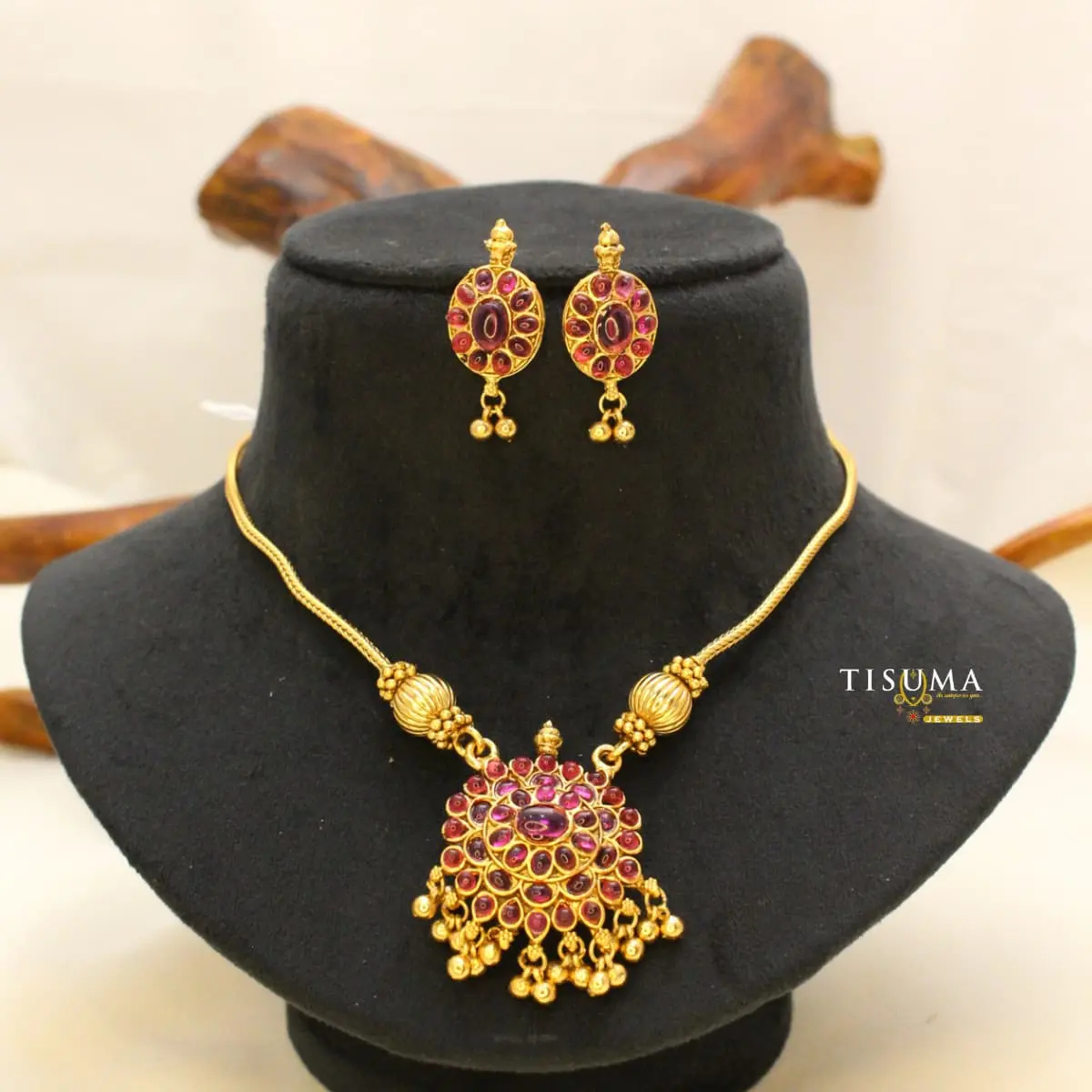 Traditional Antique Matte Gold Plated South Indian Floral Oval Medallion Ruby Kemp Short Necklace with Ghungroo Droplets and Matching Drop Earrings TIS-ATG-081 for Women
