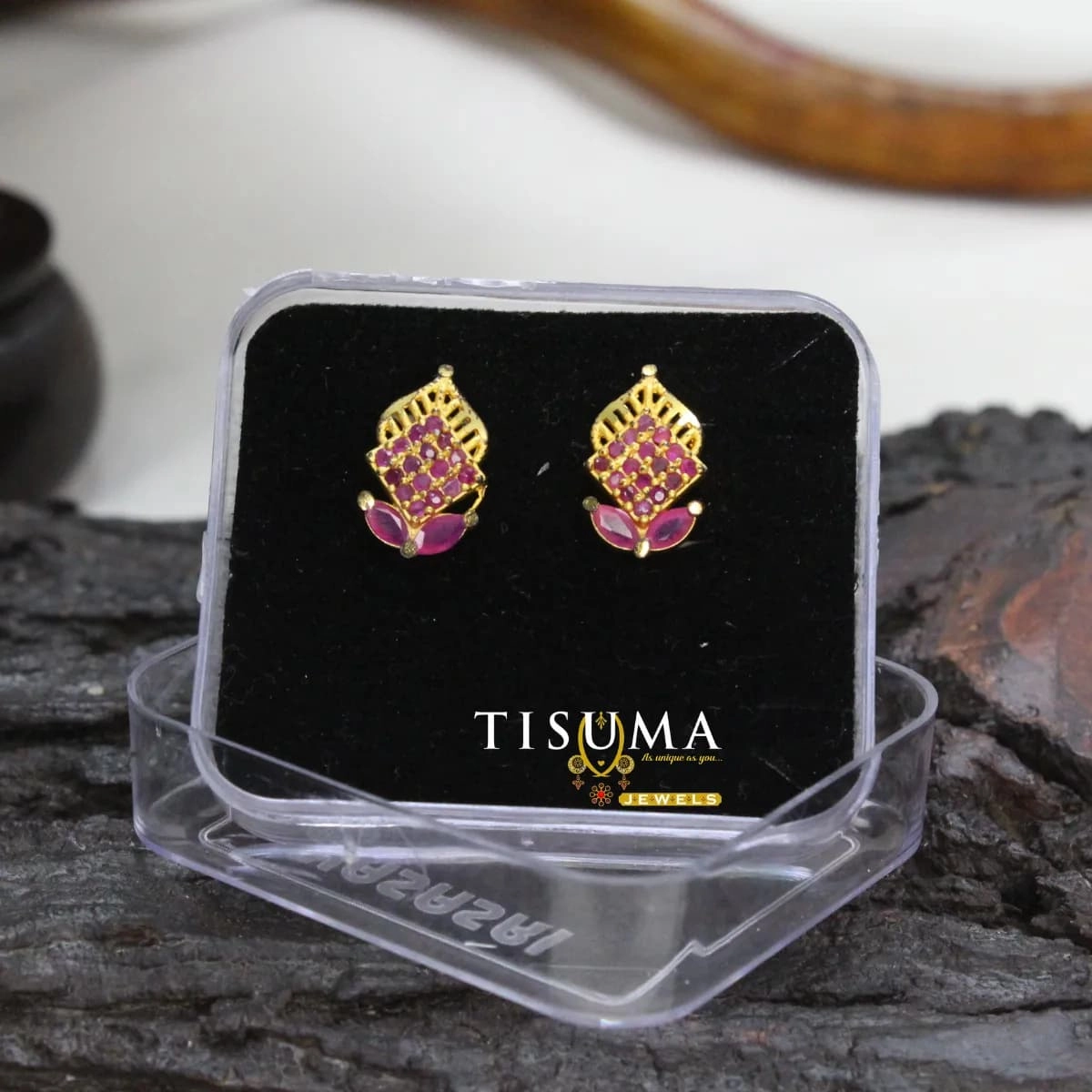 Pink stone geometric designer stud earrings with gold-tone finish from Tisuma Jewels