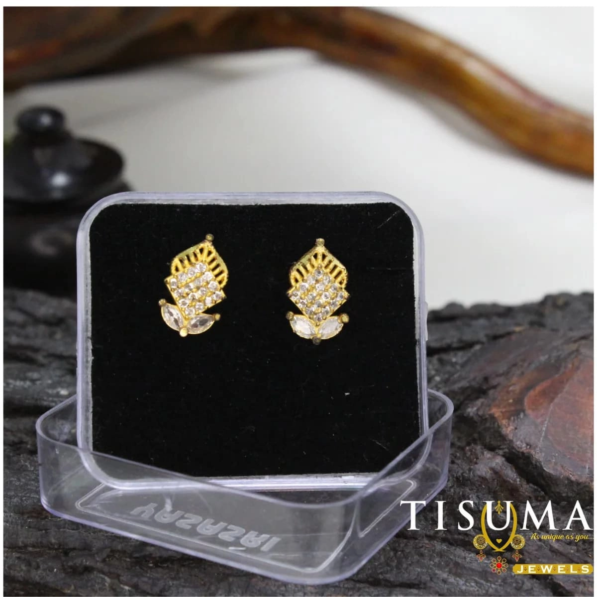 Gold-tone white AD stone floral stud earrings with geometric design