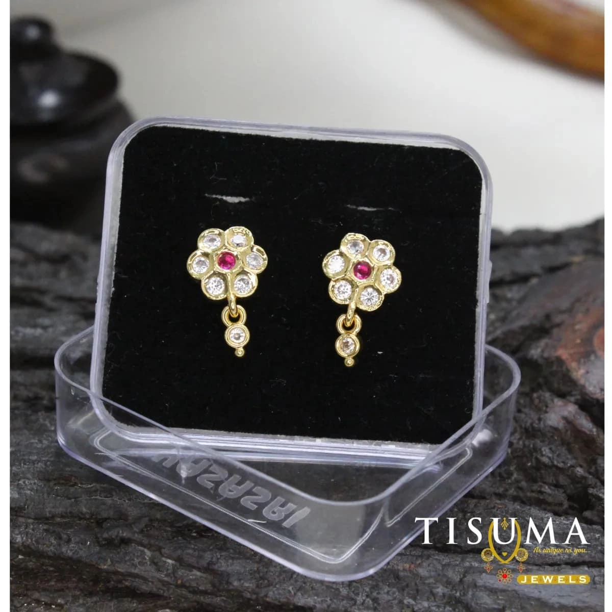 Gold-tone floral drop earrings with pink centre stones and white stone accents
