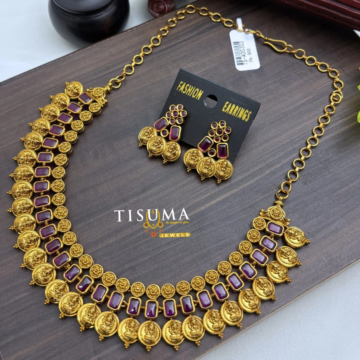 Antique gold finish coin necklace set with purple rectangular stones, traditional coin motifs, and matching purple stone earrings by Tisuma Jewels.