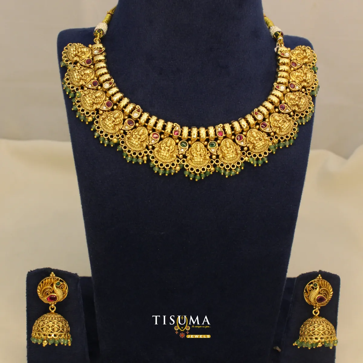 Antique gold Lakshmi necklace set with green bead drops and matching jhumka earrings – Tisuma Jewels