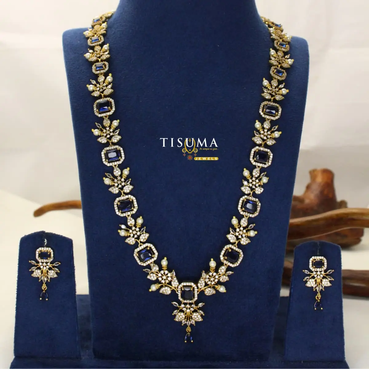Tisuma Jewels traditional gold haram necklace set with blue stones, floral CZ detailing, pearl accents and matching earrings