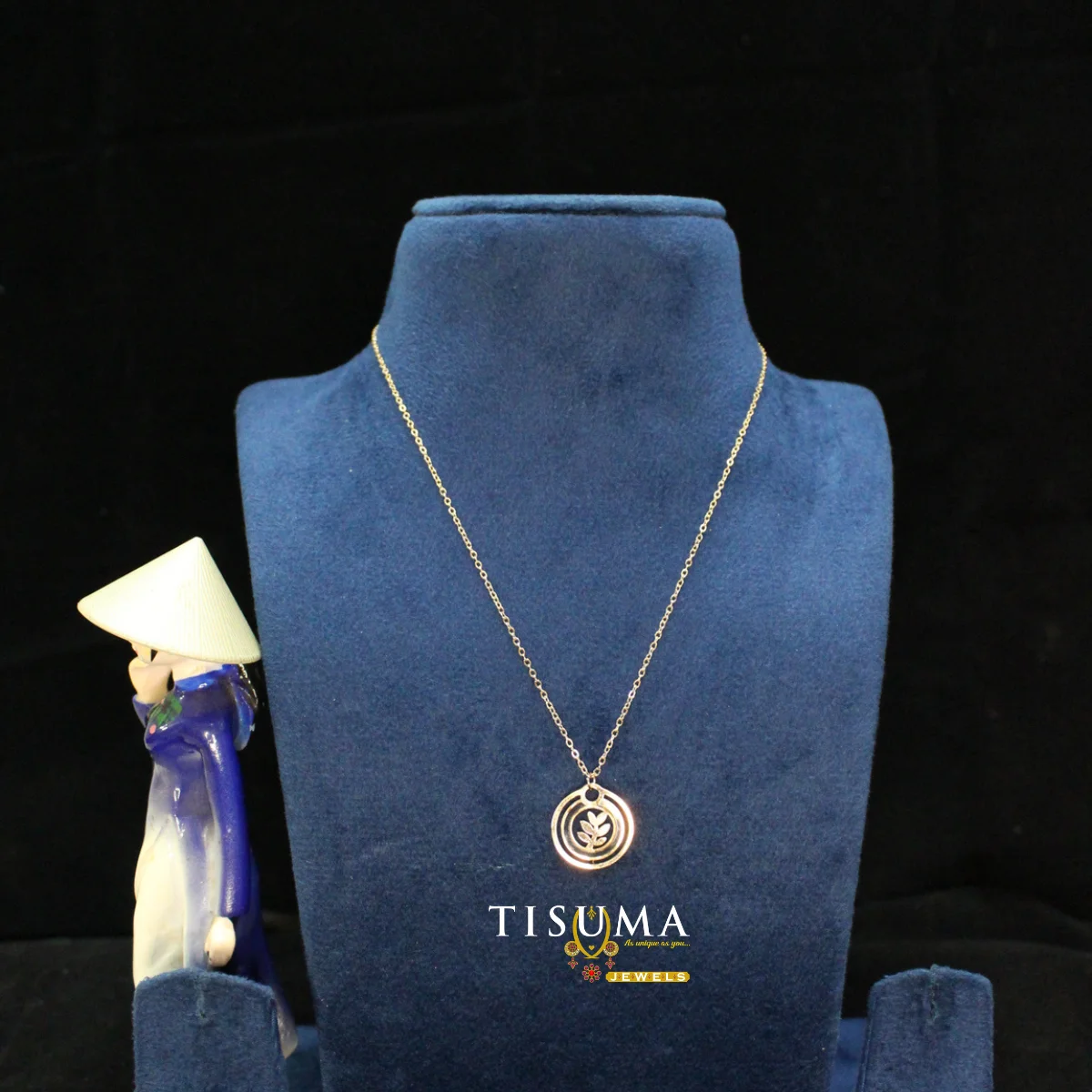 Gold-tone circular floral pendant necklace by Tisuma Jewels