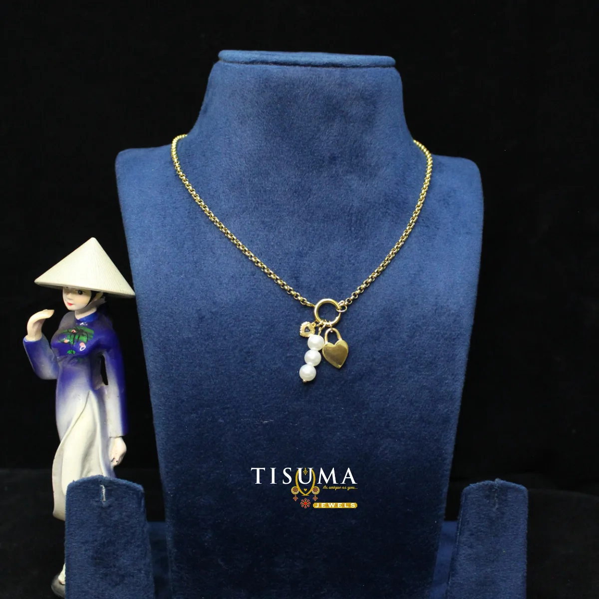 TISUMA JEWELS gold-tone necklace with heart charm and dangling pearl-style beads