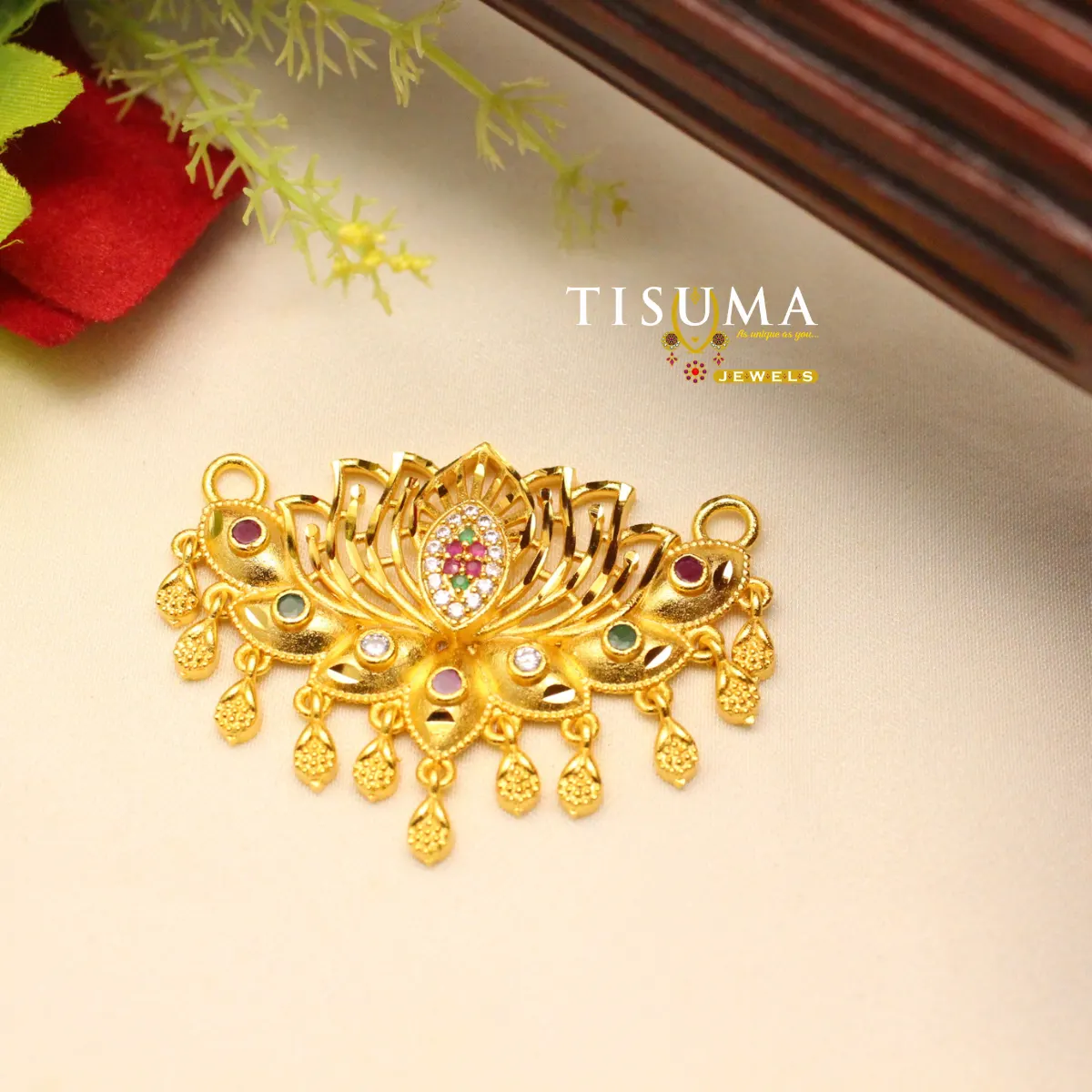 Gold plated lotus design pendant with colourful stones and decorative hanging motifs