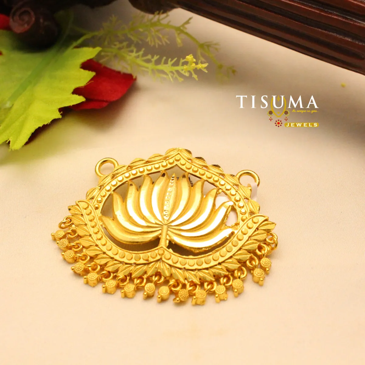 Tisuma Jewels traditional gold-tone lotus pendant with decorative hanging beads
