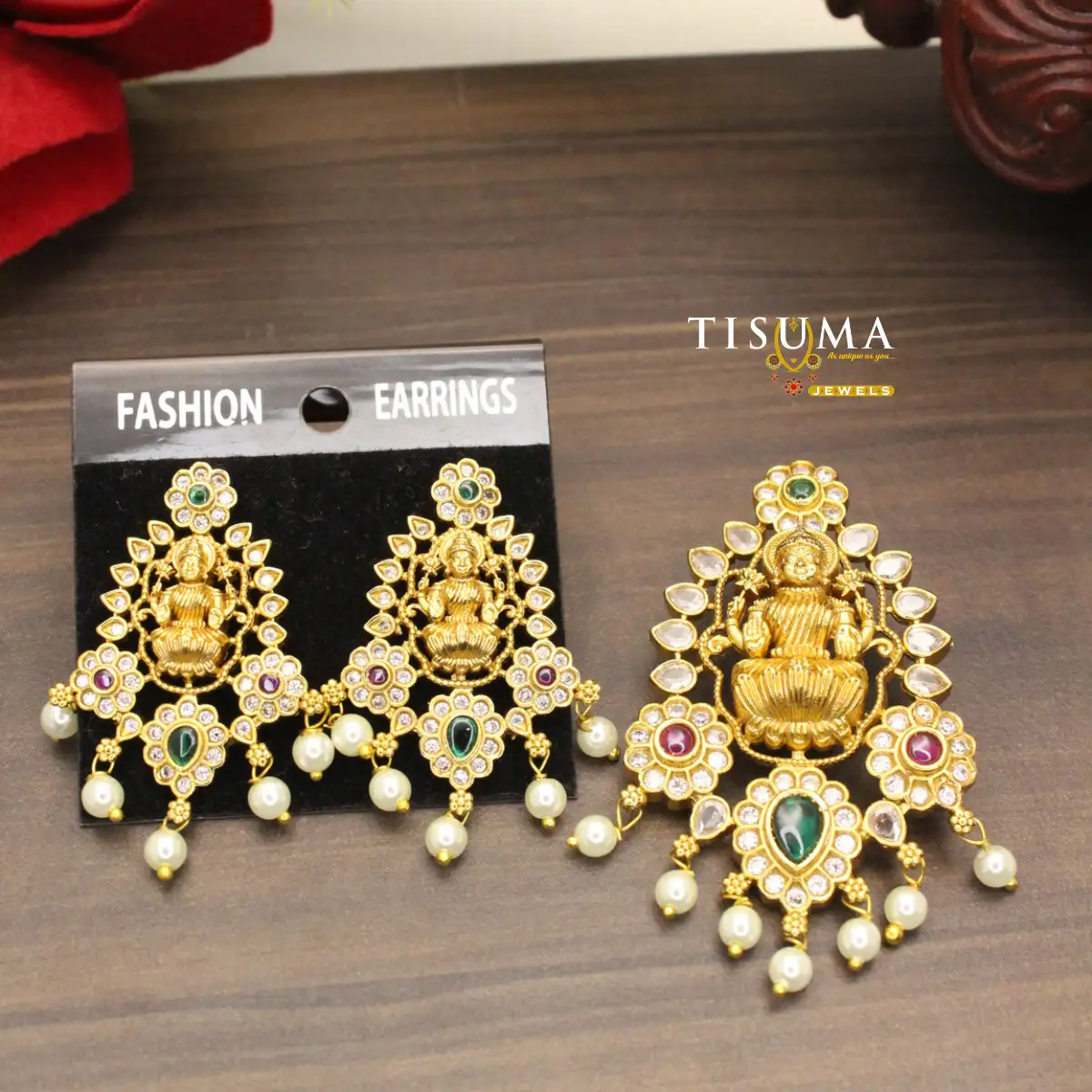 Lakshmi temple pendant with matching earrings, green and red stones, and pearl-style drops