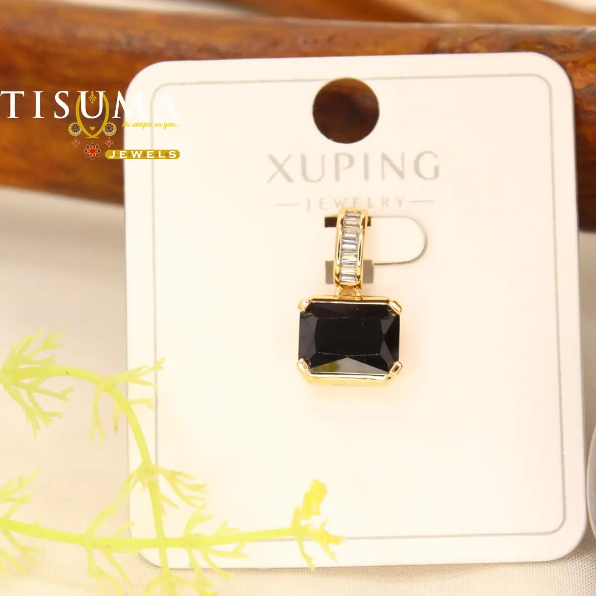 Black rectangular stone gold-tone pendant by Tisuma Jewels