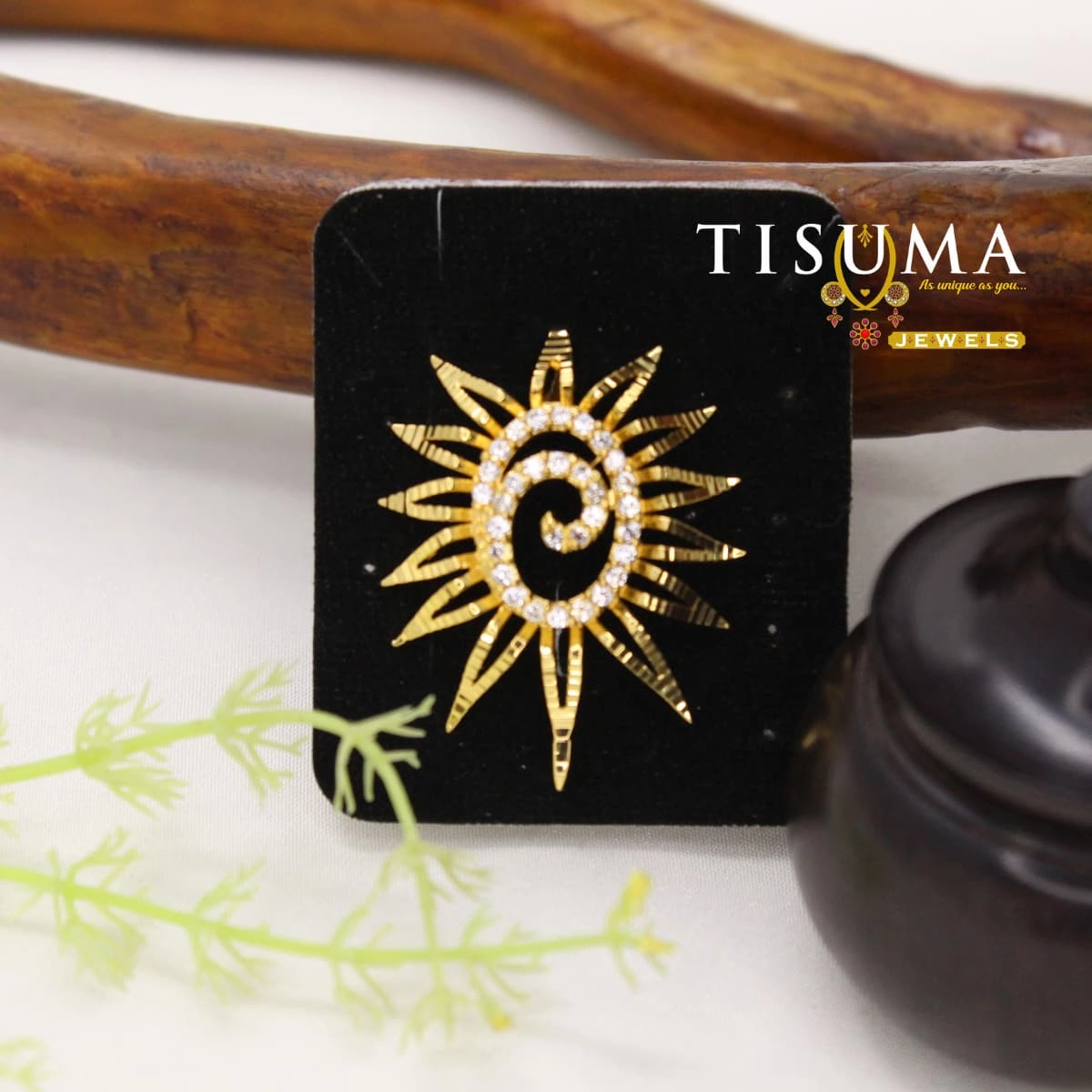 Gold-tone sunburst pendant with crystal-studded spiral centre by Tisuma Jewels