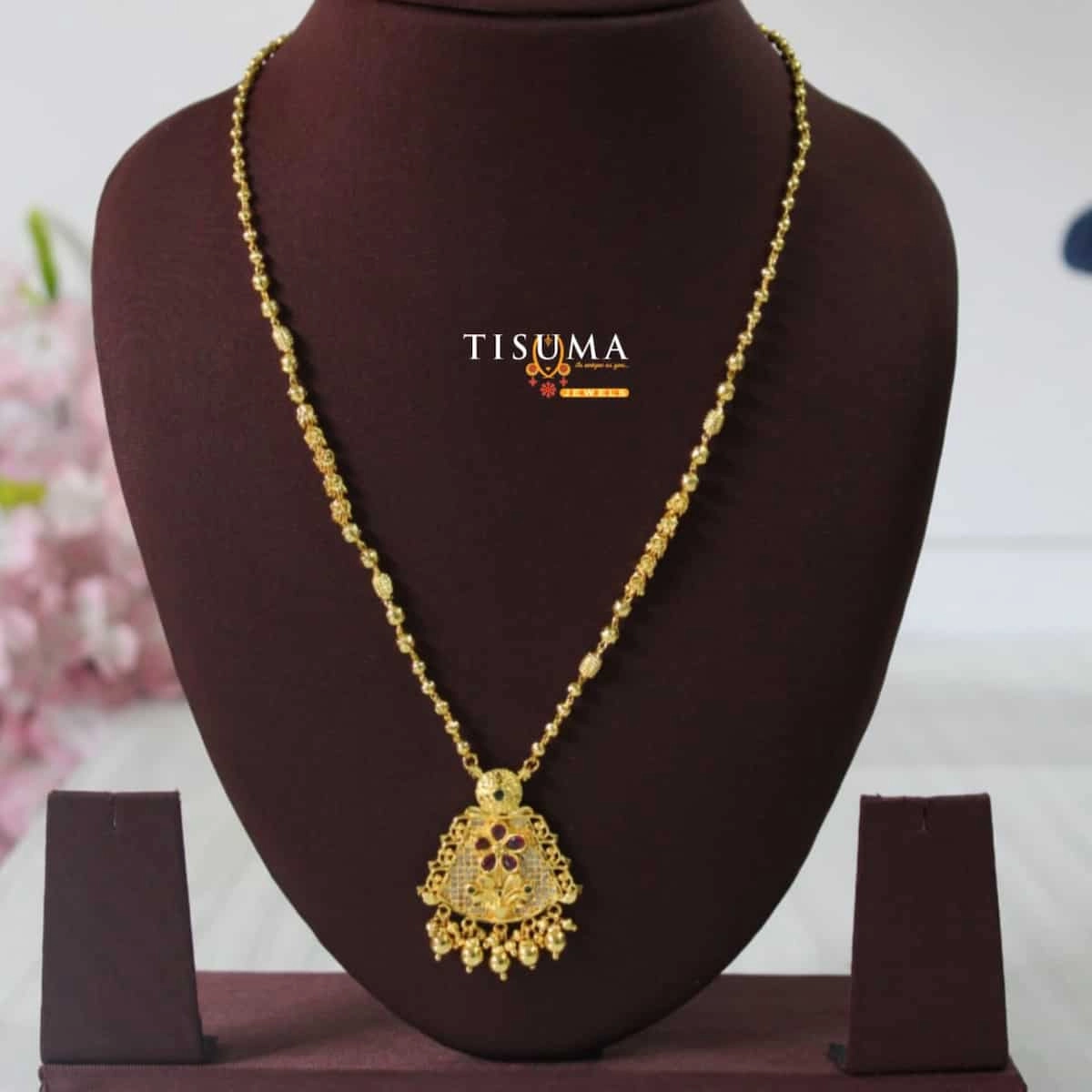 Tisuma Jewels one gram gold forming chain with triangular floral pendant and red accents